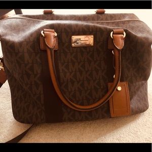 EUC Authentic MK weekender pvc duffel